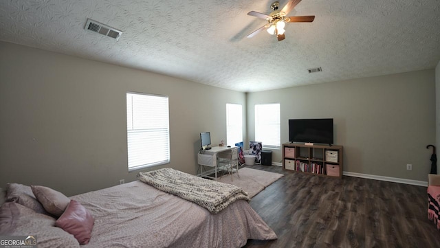 400 Silver Spring St, Dallas, GA 30157 - bedroom featuring a textured ceiling, wood finished floors, and ceiling fan