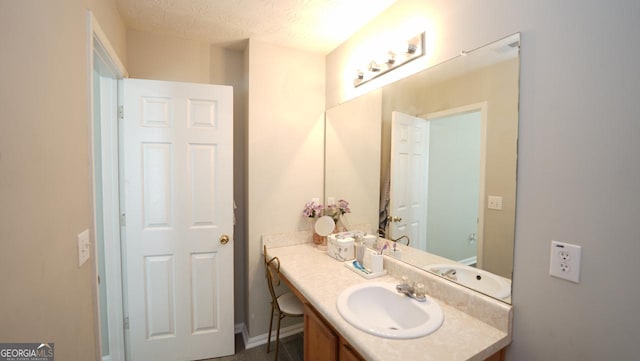 400 Silver Spring St, Dallas, GA 30157 - bathroom with vanity and baseboards