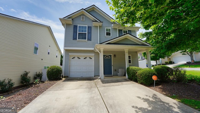 400 Silver Spring St, Dallas, GA 30157 - traditional home with a porch, an attached garage, and concrete driveway