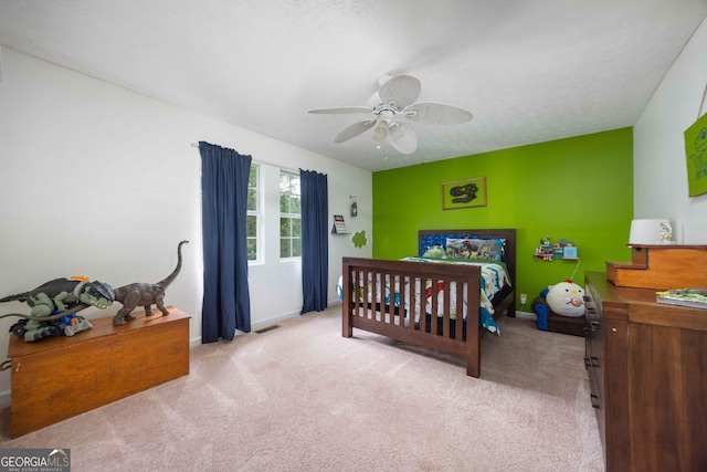 1101 Moon Rd, Shiloh, GA 31826 - carpeted bedroom with baseboards and a ceiling fan