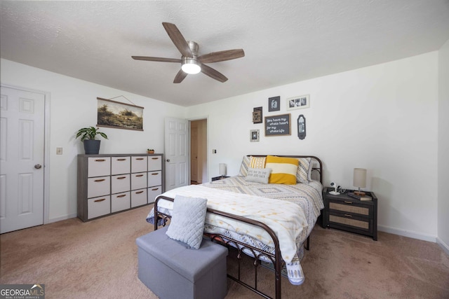 1101 Moon Rd, Shiloh, GA 31826 - carpeted bedroom featuring a ceiling fan and baseboards