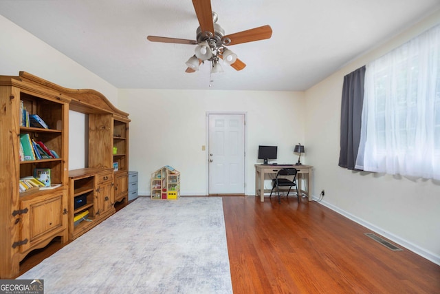 1101 Moon Rd, Shiloh, GA 31826 - home office featuring wood finished floors and a ceiling fan