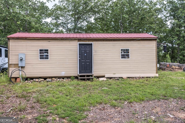 1101 Moon Rd, Shiloh, GA 31826 - back of property featuring a metal roof and an outbuilding