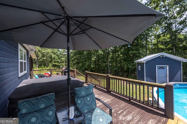 1101 Moon Rd, Shiloh, GA 31826 - wooden terrace with an outdoor pool, view of wooded area, and a storage unit