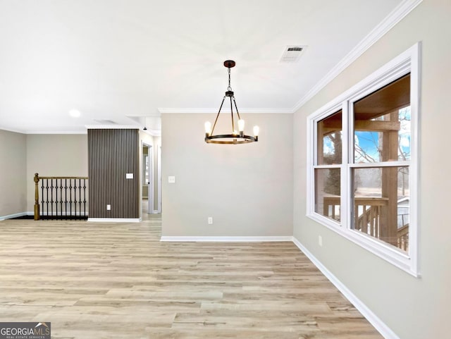 2308 Mark Trl, Decatur, GA 30032 - empty room with a chandelier, light wood-type flooring, and ornamental molding