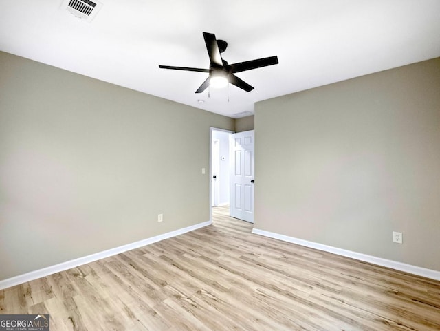 2308 Mark Trl, Decatur, GA 30032 - empty room with light wood-style floors and ceiling fan