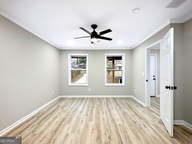 2308 Mark Trl, Decatur, GA 30032 - unfurnished room with light wood-type flooring, ceiling fan, and crown molding