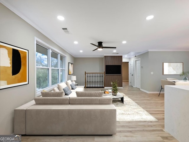2308 Mark Trl, Decatur, GA 30032 - living room with crown molding, light wood-style floors, recessed lighting, and a ceiling fan