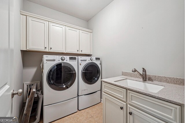 6722 Blue Heron Way, Flowery Branch, GA 30542 - washroom with cabinet space, independent washer and dryer, and light tile patterned floors