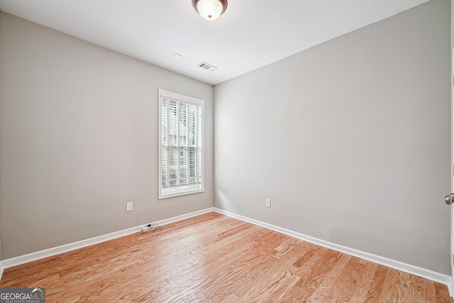 6722 Blue Heron Way, Flowery Branch, GA 30542 - unfurnished room featuring light wood finished floors