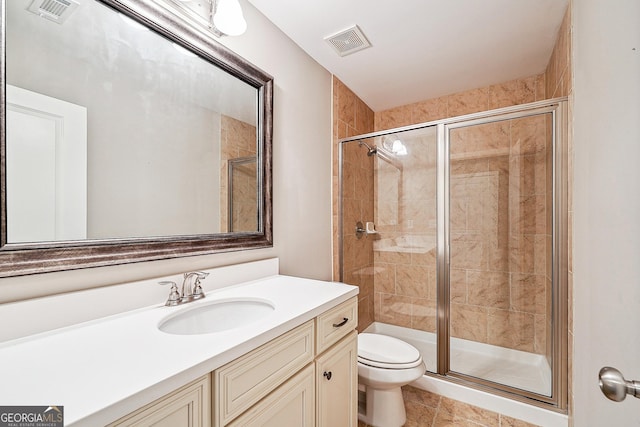 6722 Blue Heron Way, Flowery Branch, GA 30542 - bathroom featuring vanity, a shower stall, and tile patterned flooring