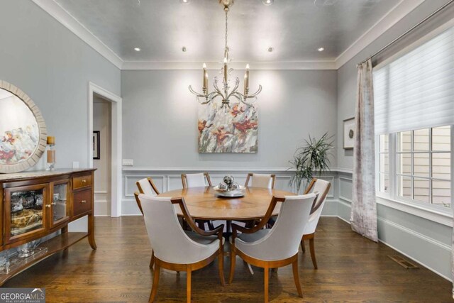 2375 Hyde Park Ct NW, Atlanta, GA 30318 - dining room featuring dark wood finished floors, a chandelier, crown molding, and recessed lighting