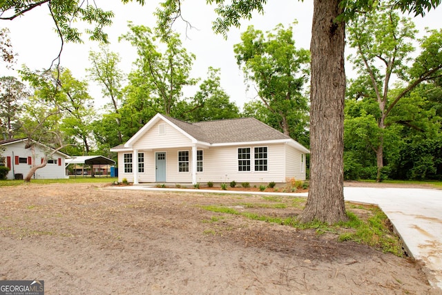 1920 Darling Ave, Waycross, GA 31501 - view of front of house with driveway, a shingled roof, and a porch