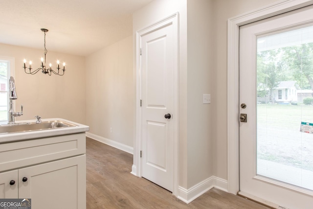 1920 Darling Ave, Waycross, GA 31501 - dining area featuring light wood-style floors and a chandelier