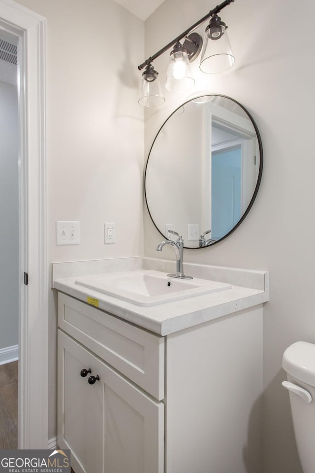 1920 Darling Ave, Waycross, GA 31501 - half bathroom with vanity and toilet