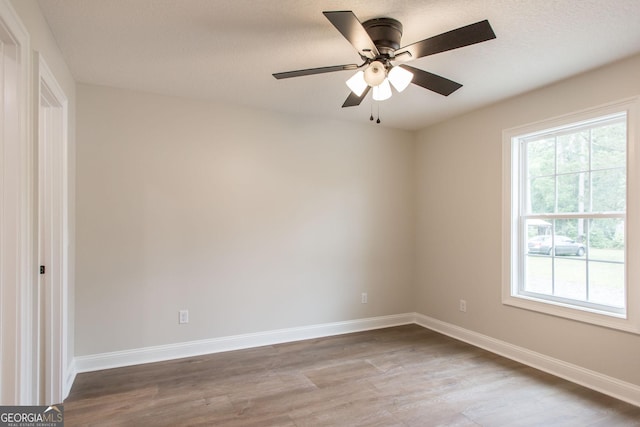 1920 Darling Ave, Waycross, GA 31501 - unfurnished room with wood finished floors and a ceiling fan