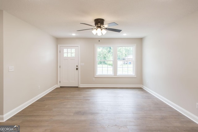 1920 Darling Ave, Waycross, GA 31501 - foyer entrance featuring ceiling fan, healthy amount of natural light, wood finished floors, and recessed lighting