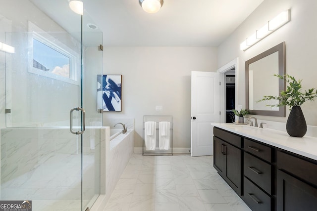 510 Walden Glen Ln, Alpharetta, GA 30004 - bathroom with vanity, a garden tub, marble finish flooring, and a marble finish shower