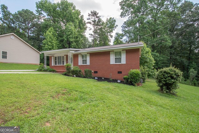 109 Susie Pl, Newnan, GA 30265 - ranch-style home featuring crawl space, brick siding, and a front lawn