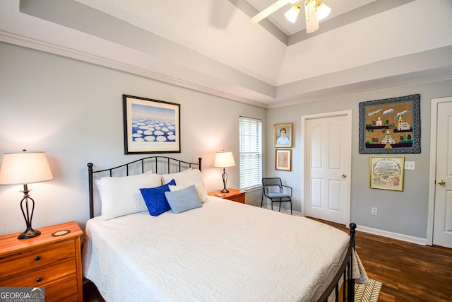17 Kingsbrook Ln, Newnan, GA 30265 - bedroom with dark wood finished floors, a tray ceiling, and ceiling fan