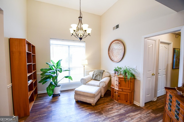 17 Kingsbrook Ln, Newnan, GA 30265 - living area with a chandelier, dark wood-style flooring, and a towering ceiling