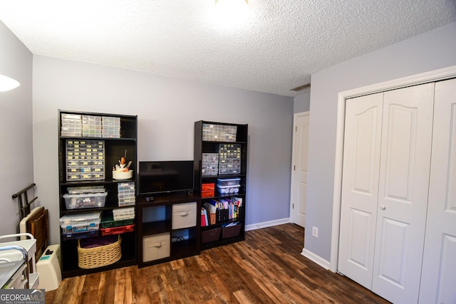 17 Kingsbrook Ln, Newnan, GA 30265 - rec room with wood finished floors and a textured ceiling