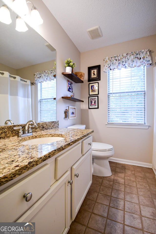 17 Kingsbrook Ln, Newnan, GA 30265 - bathroom with vanity, a textured ceiling, and a shower with shower curtain