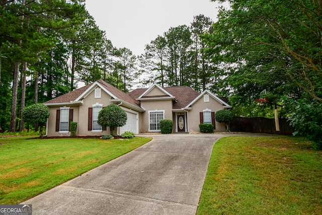 17 Kingsbrook Ln, Newnan, GA 30265 - traditional-style home with an attached garage, stucco siding, and concrete driveway