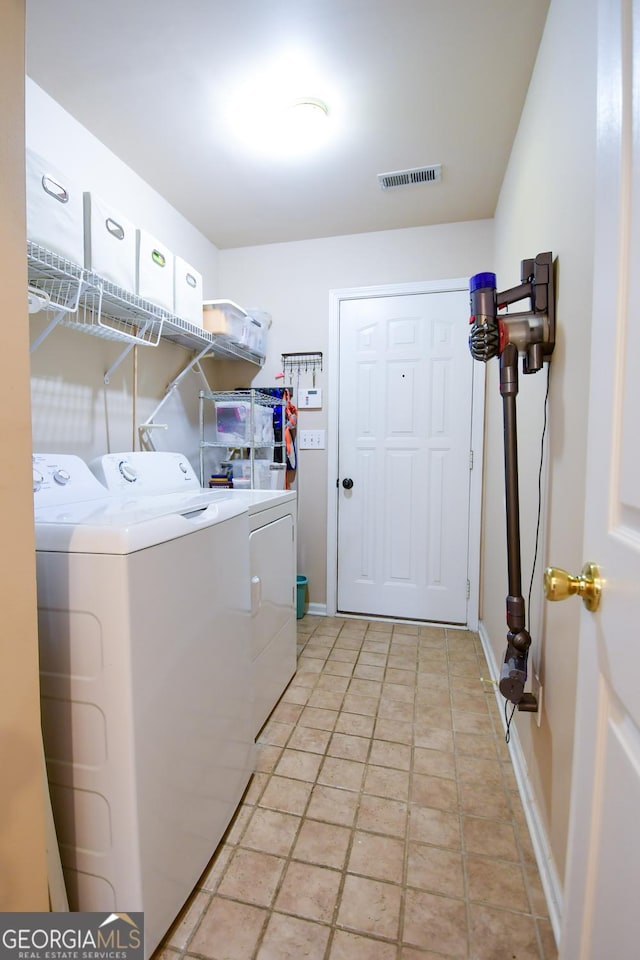 17 Kingsbrook Ln, Newnan, GA 30265 - laundry area featuring washer and clothes dryer and baseboards
