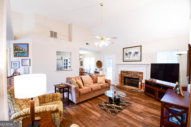 17 Kingsbrook Ln, Newnan, GA 30265 - living area featuring a ceiling fan, wood finished floors, a fireplace, and lofted ceiling