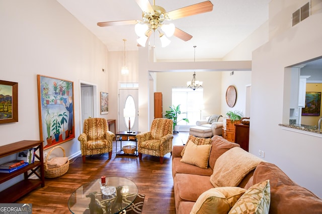 17 Kingsbrook Ln, Newnan, GA 30265 - living room with wood finished floors, a ceiling fan, a chandelier, and a high ceiling