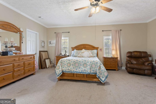 1641 Garland Mountain Trl, Waleska, GA 30183 - bedroom with light colored carpet, a textured ceiling, ornamental molding, and ceiling fan