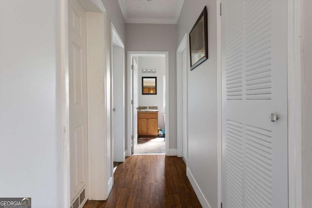 1641 Garland Mountain Trl, Waleska, GA 30183 - hallway featuring dark wood-type flooring and ornamental molding