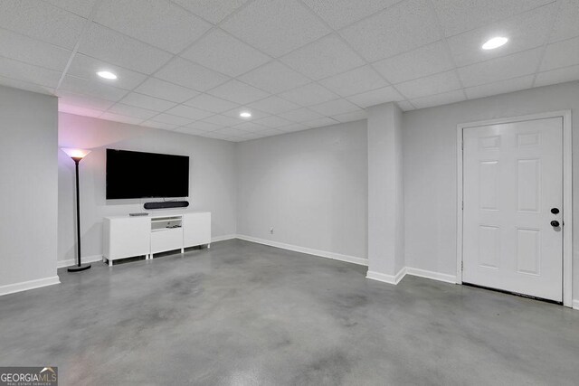 2095 Honeysuckle Dr, Cumming, GA 30040 - unfurnished living room with finished concrete floors, recessed lighting, and a drop ceiling