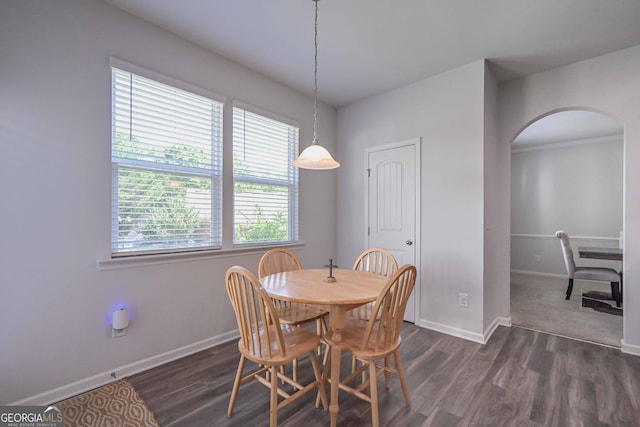 110 Serendipity Way, Dallas, GA 30157 - dining area featuring arched walkways and dark wood-style flooring