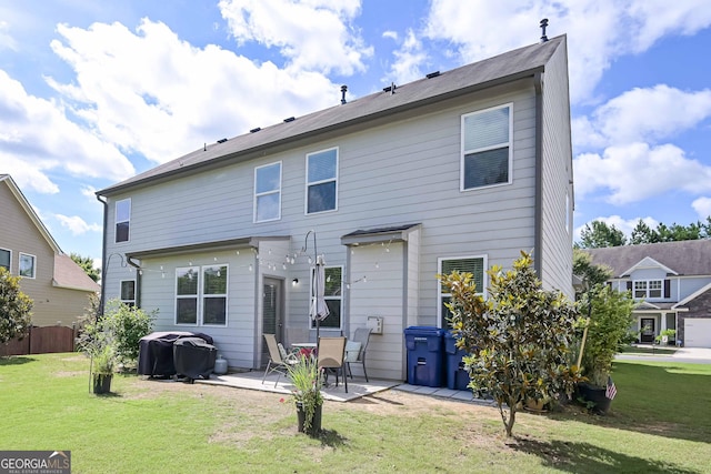 110 Serendipity Way, Dallas, GA 30157 - rear view of property with a patio and a lawn