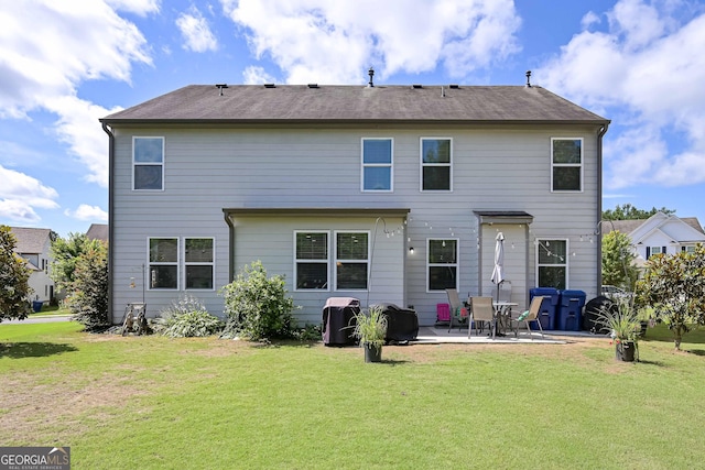 110 Serendipity Way, Dallas, GA 30157 - back of property featuring a patio and a yard