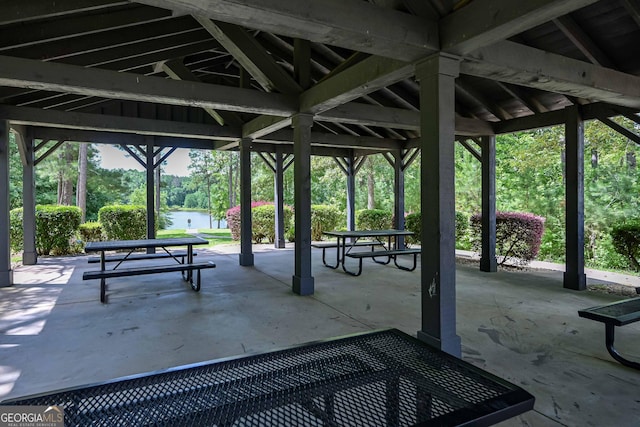 110 Serendipity Way, Dallas, GA 30157 - view of property's community featuring a water view, a patio, and view of scattered trees