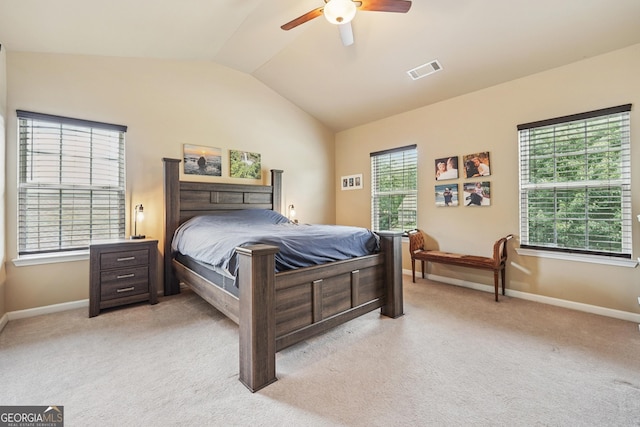 6521 Boulder Crest Ct, Flowery Branch, GA 30542 - bedroom with lofted ceiling, light carpet, and a ceiling fan
