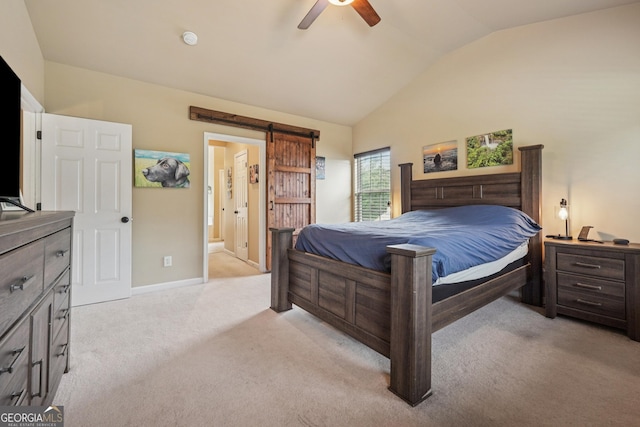 6521 Boulder Crest Ct, Flowery Branch, GA 30542 - bedroom featuring lofted ceiling, light colored carpet, a barn door, a ceiling fan, and ensuite bathroom