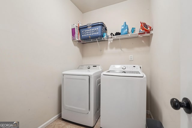 6521 Boulder Crest Ct, Flowery Branch, GA 30542 - laundry area featuring washing machine and dryer and light tile patterned floors