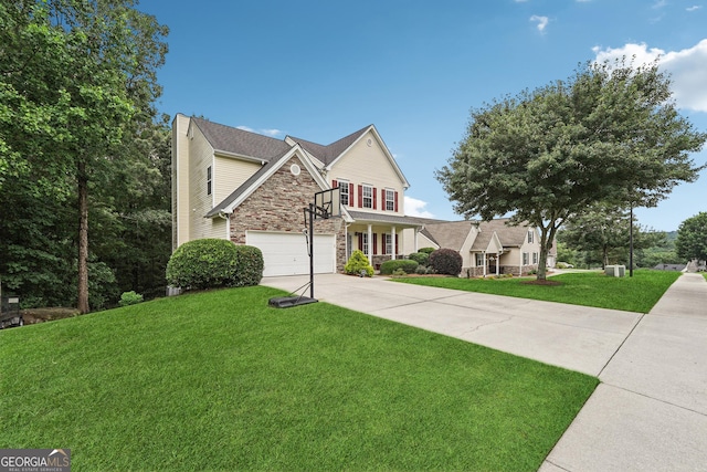 6521 Boulder Crest Ct, Flowery Branch, GA 30542 - traditional home with stone siding, driveway, and a front yard