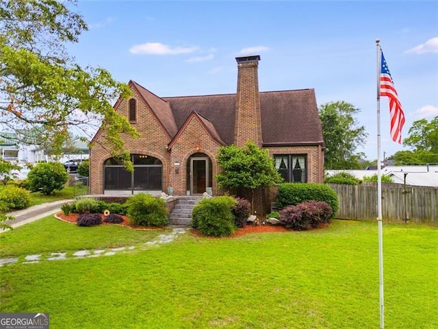303 Hardee St, Dallas, GA 30132 - english style home with brick siding and a chimney