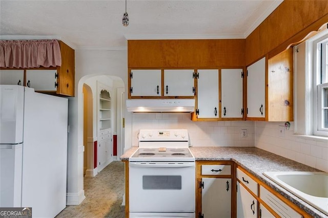 303 Hardee St, Dallas, GA 30132 - kitchen featuring white appliances, under cabinet range hood, backsplash, light countertops, and ornamental molding