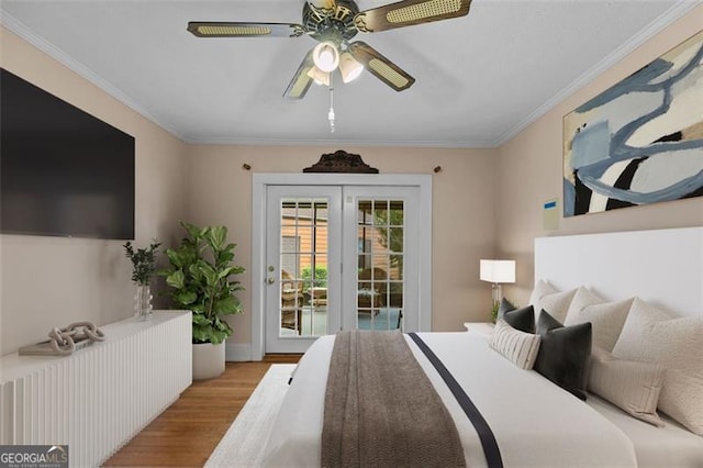 303 Hardee St, Dallas, GA 30132 - bedroom featuring wood finished floors, access to exterior, ornamental molding, and a ceiling fan