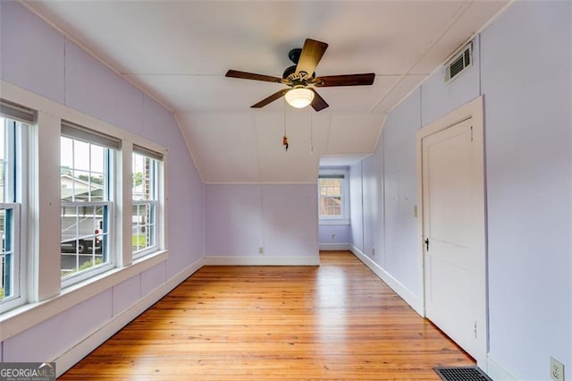 303 Hardee St, Dallas, GA 30132 - bonus room with light wood-style flooring, vaulted ceiling, and a ceiling fan