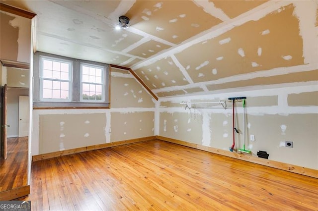 303 Hardee St, Dallas, GA 30132 - additional living space with hardwood / wood-style flooring and lofted ceiling