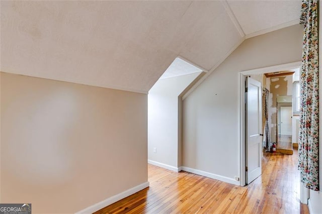 303 Hardee St, Dallas, GA 30132 - bonus room featuring light wood-type flooring and vaulted ceiling