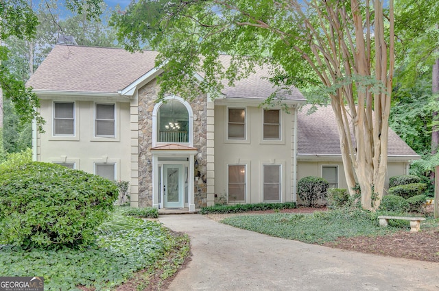 40 Springwater Chase, Newnan, GA 30265 - view of front of property featuring a shingled roof, stucco siding, and stone siding