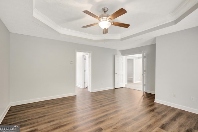 40 Springwater Chase, Newnan, GA 30265 - unfurnished room with a raised ceiling, crown molding, wood finished floors, and ceiling fan